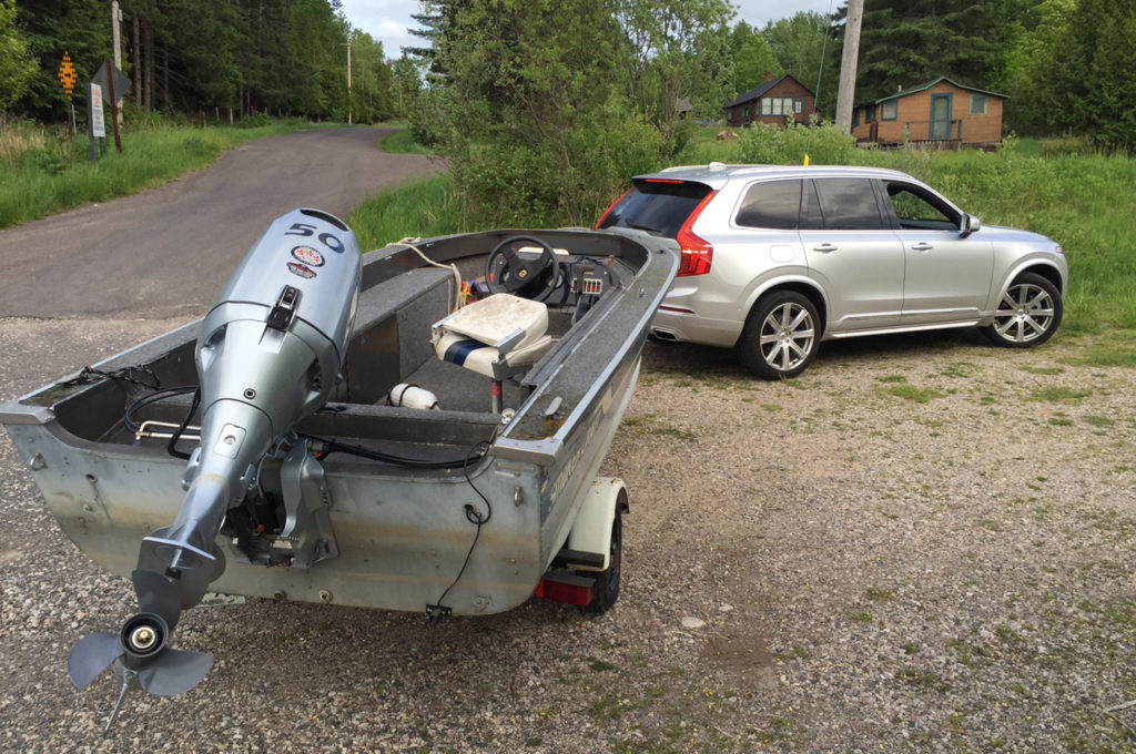 The 2016 Volvo XC90 T6 AWD towing a boat The 2016 Volvo XC90 T6 AWD towing a boat